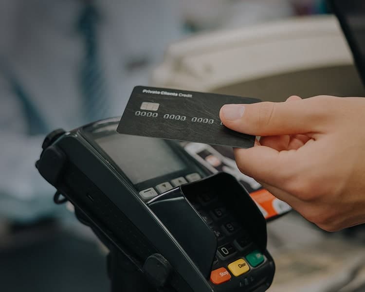 Customer using a mobile payment terminal supported by retail wireless solutions